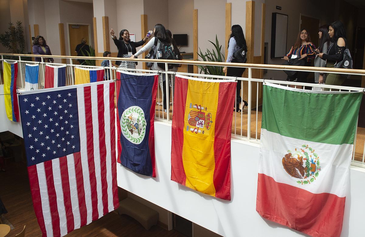Flags hanging on banister for the LatinX Conference