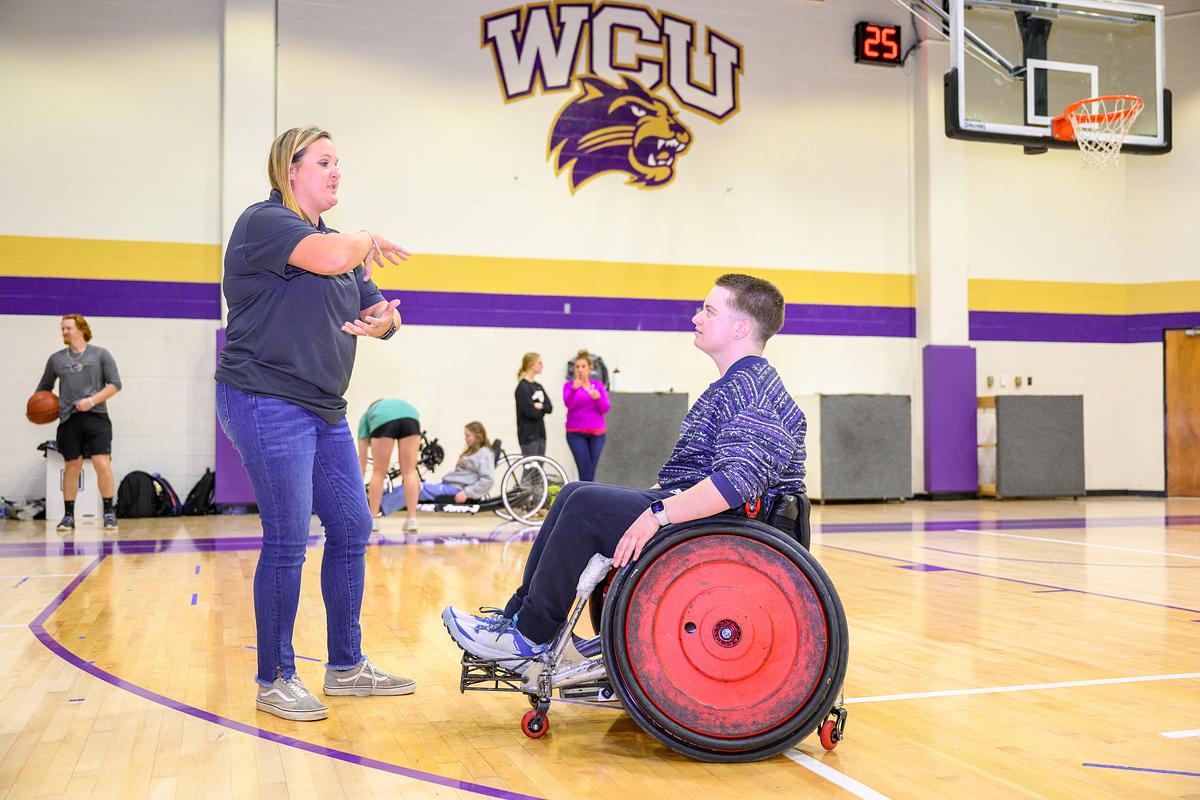 Beautiful red flowers with a mountain and mist in the background in Costa Rica