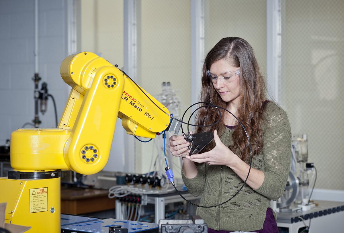 Engineering student working with robotics