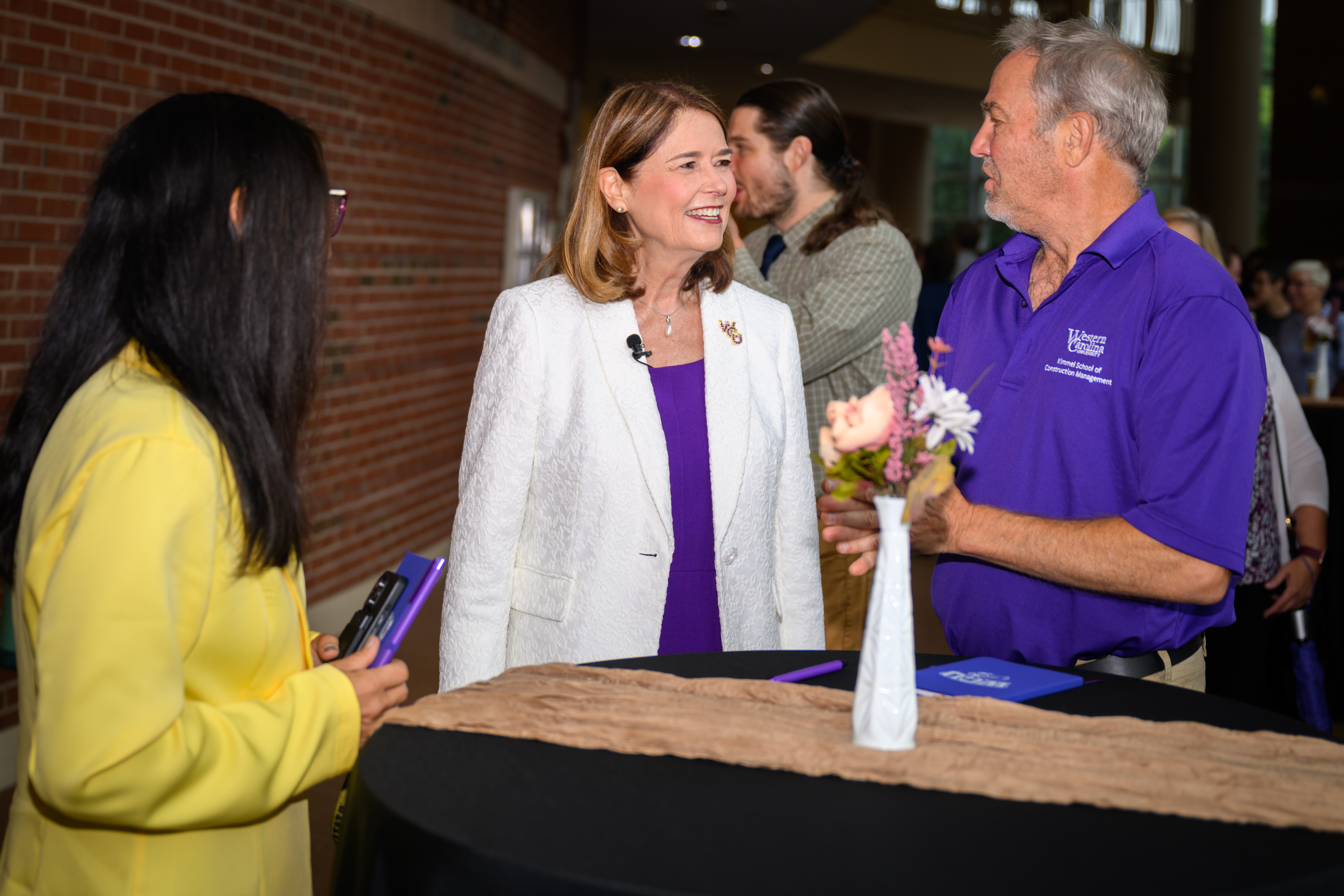 Chancellor Kelli R. Brown greets faculty and staff prior to Fall Opening Assembly