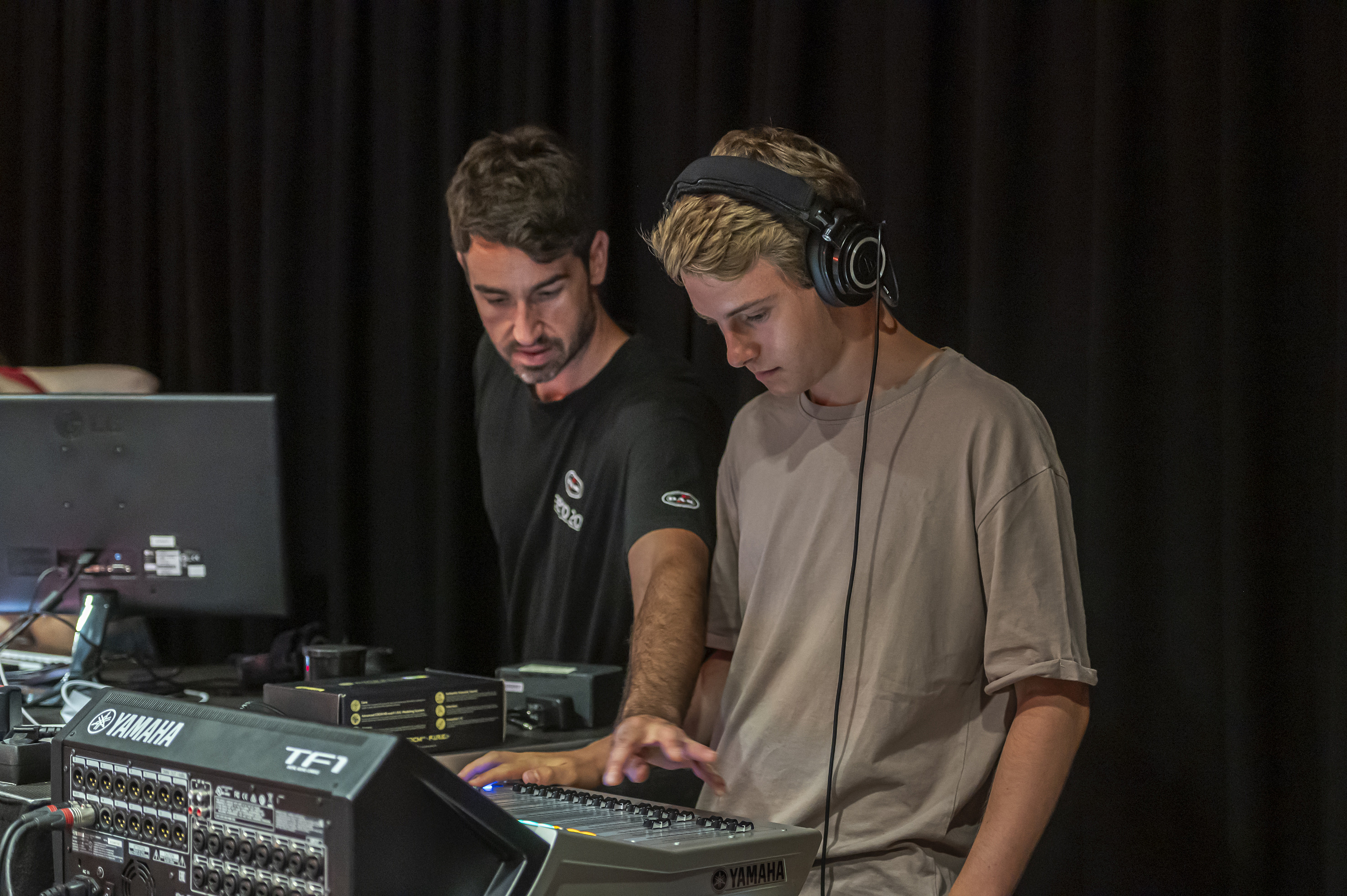 Two students using recording studio